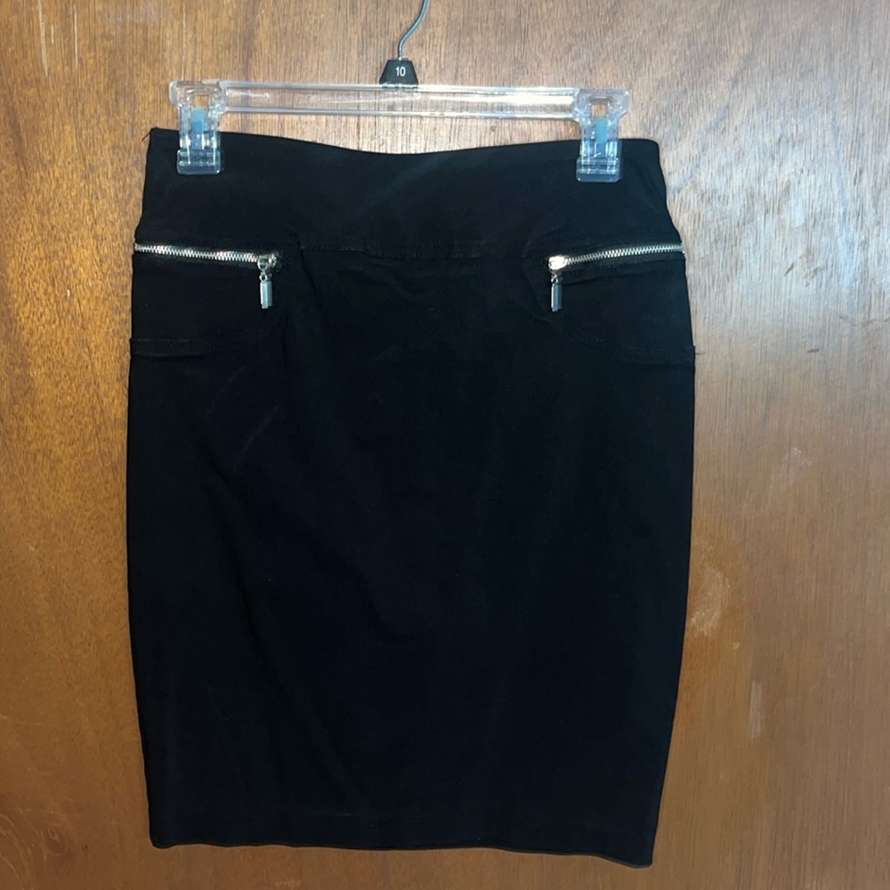 Medium length, black pencil skirts with two pockets